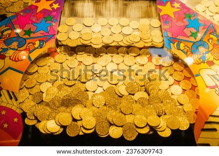 Golden tokens in a gaming machine in a casino.