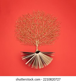 Golden Tree Growing From The Old Book, Education And Knowledge Concept. For Book Lovers. Flat Lay.