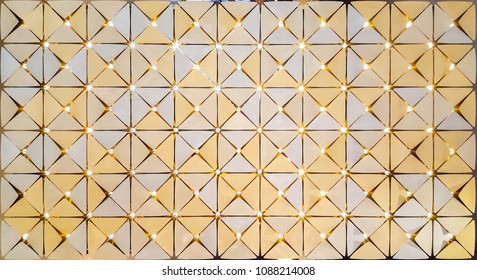 Golden triangle shaped rectangular plate attached to the lamp look quaint.Background and Wallpaper.