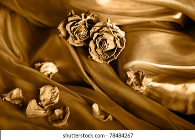 Golden Vintage Background. Rose On Satin Texture. Gold Colored Image