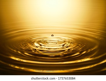 Golden Water Ripple And Water Drop