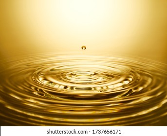 Golden Water Ripple And Water Drop