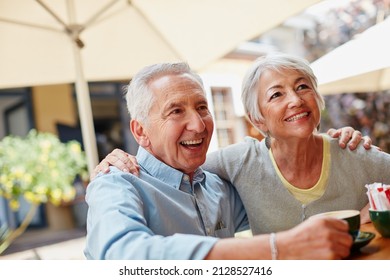 The golden years are going great. Shot of a senior couple having coffee at a cafe. - Powered by Shutterstock