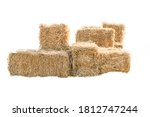 Golden yellow haystack isolated on a white background hay is a tightly joined bale of straw.