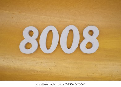 The golden yellow painted wood panel for the background, number 8008, is made from white painted wood.