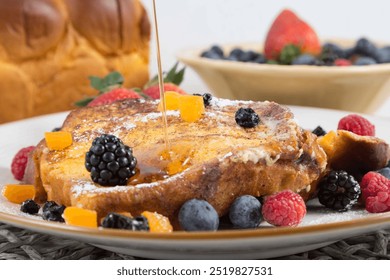 Golden-Brown French Toast with Berries, French Toast with Maple Syrup and Fruit, Classic French Toast Recipe - Powered by Shutterstock