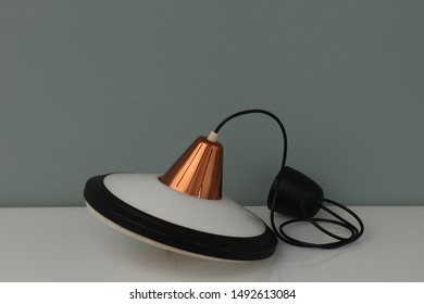 gold-plated lamp with a plastic element - Shutterstock ID 1492613084