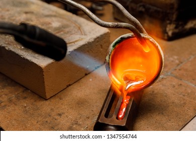 goldsmith's workshop, gold melt - Shutterstock ID 1347554744