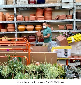 GOLETA, CA, USA - MAY 9,2020:  Home Depot Store Interior During The Covid19 World Pandemic With Man Shopping With A Protective N95 Mask.