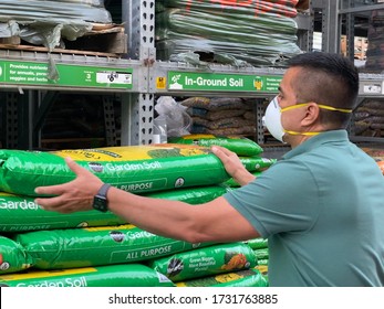 GOLETA, CA, USA - MAY 9,2020:  Home Depot Store Interior During The Covid19 World Pandemic With Man Shopping With A Protective N95 Mask.