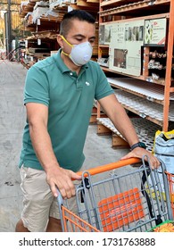 GOLETA, CA, USA - MAY 9,2020:  Home Depot Store Interior During The Covid19 World Pandemic With Man Shopping With A Protective N95 Mask.