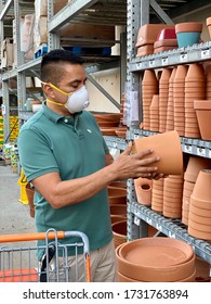 GOLETA, CA, USA - MAY 9,2020:  Home Depot Store Interior During The Covid19 World Pandemic With Man Shopping With A Protective N95 Mask.