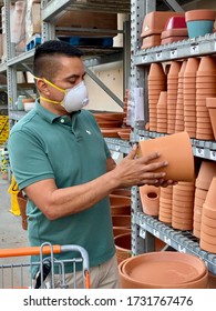 GOLETA, CA, USA - MAY 9,2020:  Home Depot Store Interior During The Covid19 World Pandemic With Man Shopping With A Protective N95 Mask.