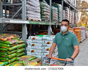 GOLETA, CA, USA - MAY 9,2020:  Home Depot Store Interior During The Covid19 World Pandemic With Man Shopping With A Protective N95 Mask.