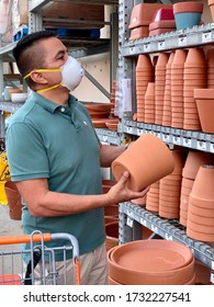 GOLETA, CA, USA - MAY 9,2020:  Home Depot Store Interior During The Covid19 World Pandemic With Man Shopping With A Protective N95 Mask.