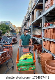 GOLETA, CA, USA - MAY 9,2020:  Home Depot Store Interior During The Covid19 World Pandemic With Man Shopping With A Protective N95 Mask.