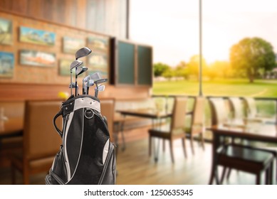 Golf Bag  And Golf Clubs  Of Golfer Have Breakfast In Club House Restaurants At Golf Course. Before Playing The Game In The Morning.