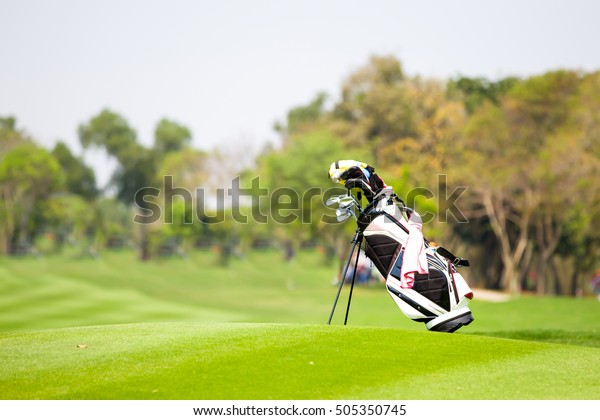 Golf bag,\
Golf clubs in golf bag on the\
fairway.