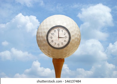 A golf ball and clock remind the golfer of their tee off.
