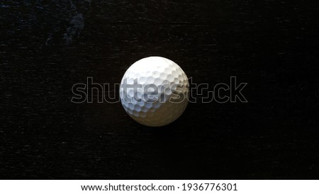 Golf Ball in Dark Background