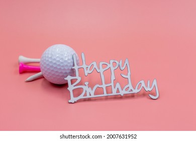 Golf Ball With Happy Birthday Sign On Pink Background