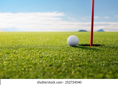 Golf Ball And Hole