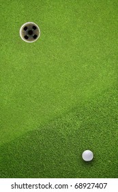 golf ball hole on a field - Shutterstock ID 68927407
