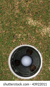 Golf Ball In The Hole With Room For Copy Above