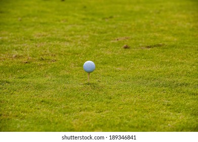Golf ball lying in the fairway - Shutterstock ID 189346841
