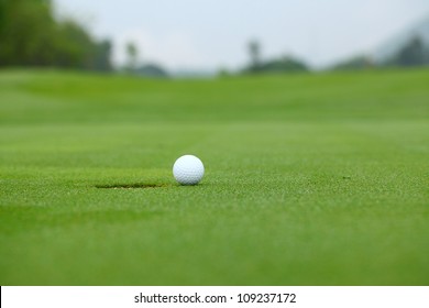 Golf Ball Near Hole