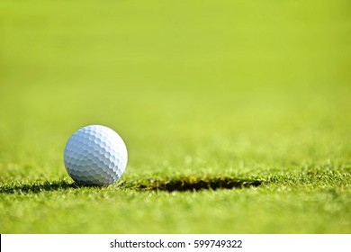 Golf Ball Near Hole