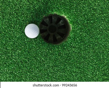 Golf Ball Near The Hole