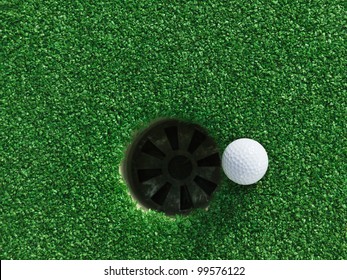 Golf Ball Near The Hole