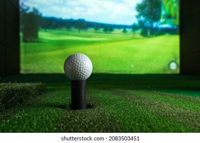 Golf ball on the background of the screen. Screen golf. - Shutterstock ID 2083503451