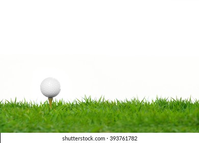 Golf Ball On Green Grass Isolated On White Background