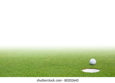 Golf Ball On Green Grass And White Background