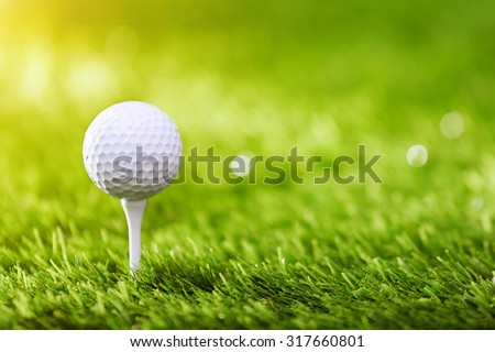 Golf ball on tee ready to be shot