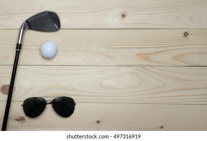 Golf And Ball On Wood Table . Top View, Flat Lay Composition 