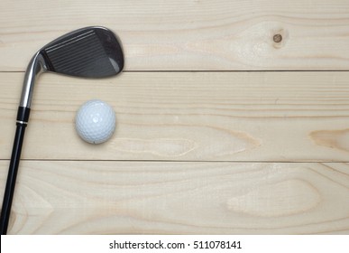 Golf And Ball On Wood Table . Top View, Flat Lay Composition 