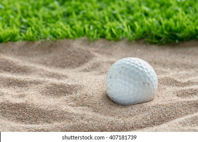 Golf Ball In Sand Bunker