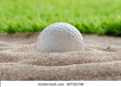 Golf Ball In Sand Bunker