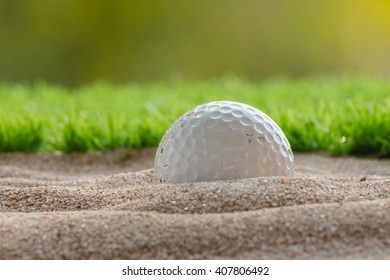 Golf Ball In Sand Bunker