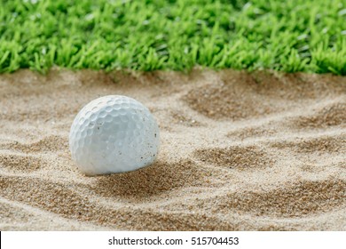 Golf Ball In Sand Bunker