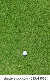 Golf Ball Sitting On A Golf Course Putting Green