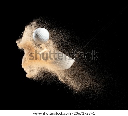 Golf ball tee explode from sand bunker. Golfer hit ball with club to sand explosion to green. Golf club hit ball tee in sand wedge bunker explosion. Black background isolated series two of images