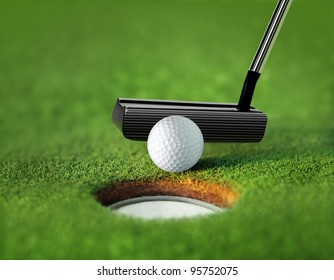 Golf Ball And Tee On Green Course In Front Of Driver