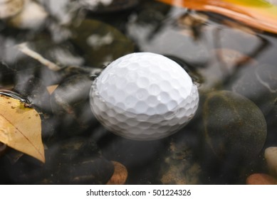 Golf Ball In Water Hazard