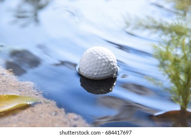 Golf Ball In Water Hazard