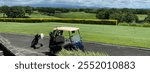 Golf cart of golf course with green grass field with blue sky. Car for golf and troll for running