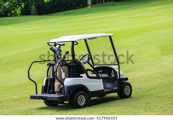 Golf cart in the green\
lawn